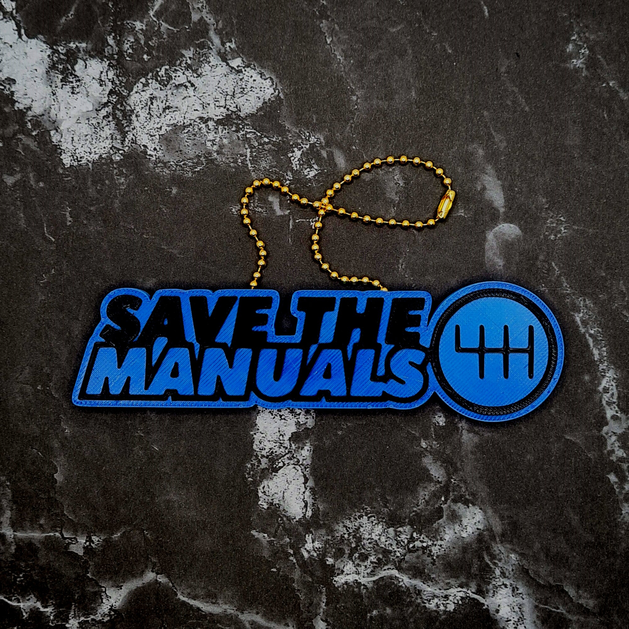 Save the Manuals Charm!